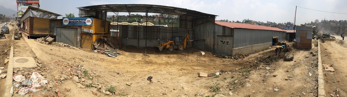 Exterior view of warehouse facilities with truck access